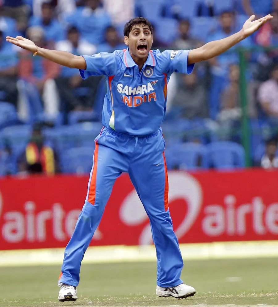 Ashish Nehra Celebrating Like A Gliding Eagle